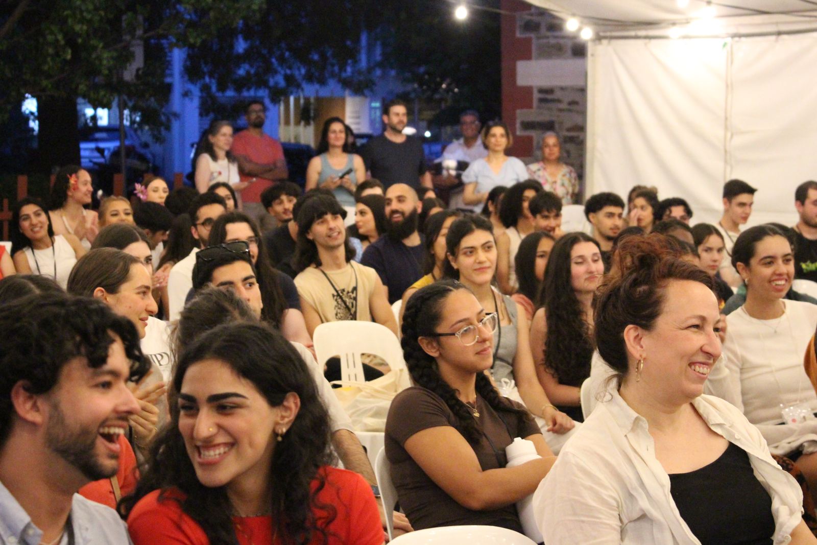 The crowd cracking up during an evening performance