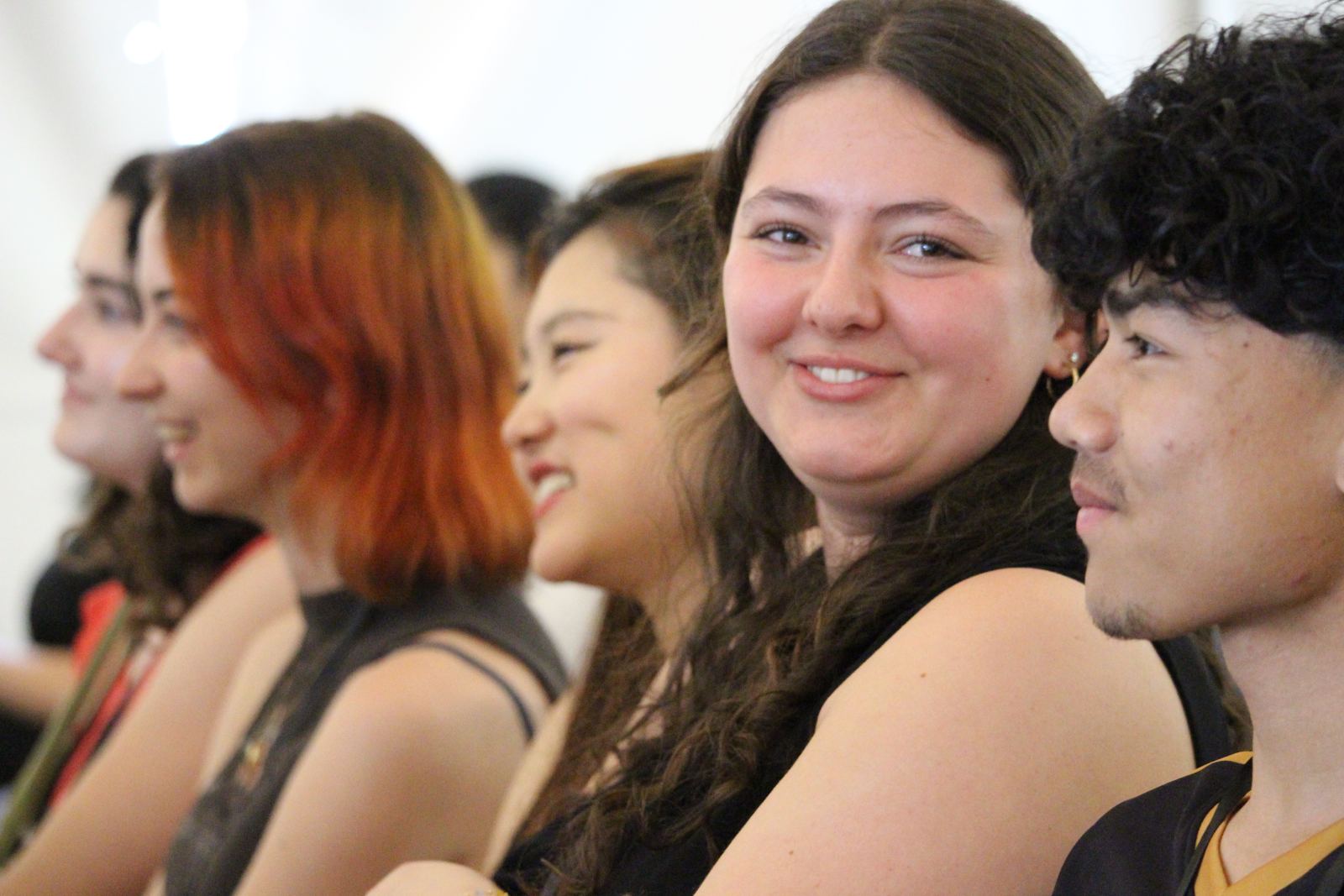 Friends smiling at each other during a session